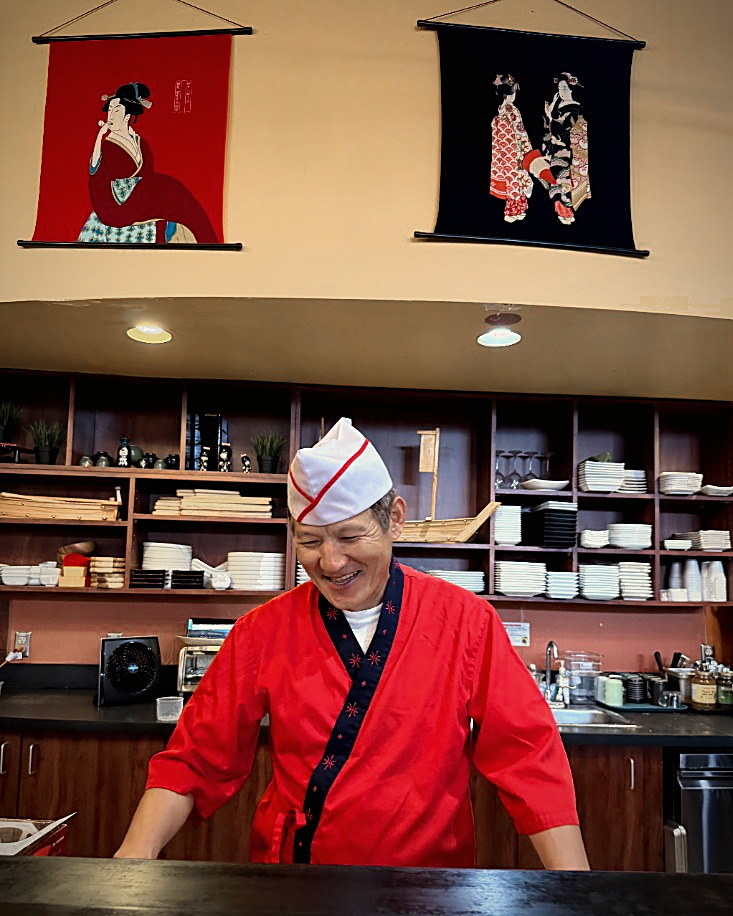 The sushi chef at Mikado behind the bar
